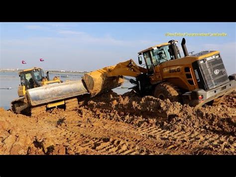 wheel loaders stuck in mud